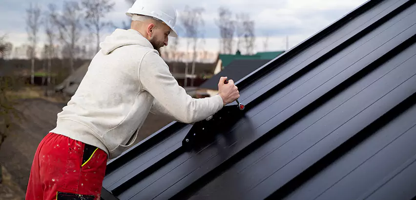 Tin Roof Ridge Cap Installation in South Elgin